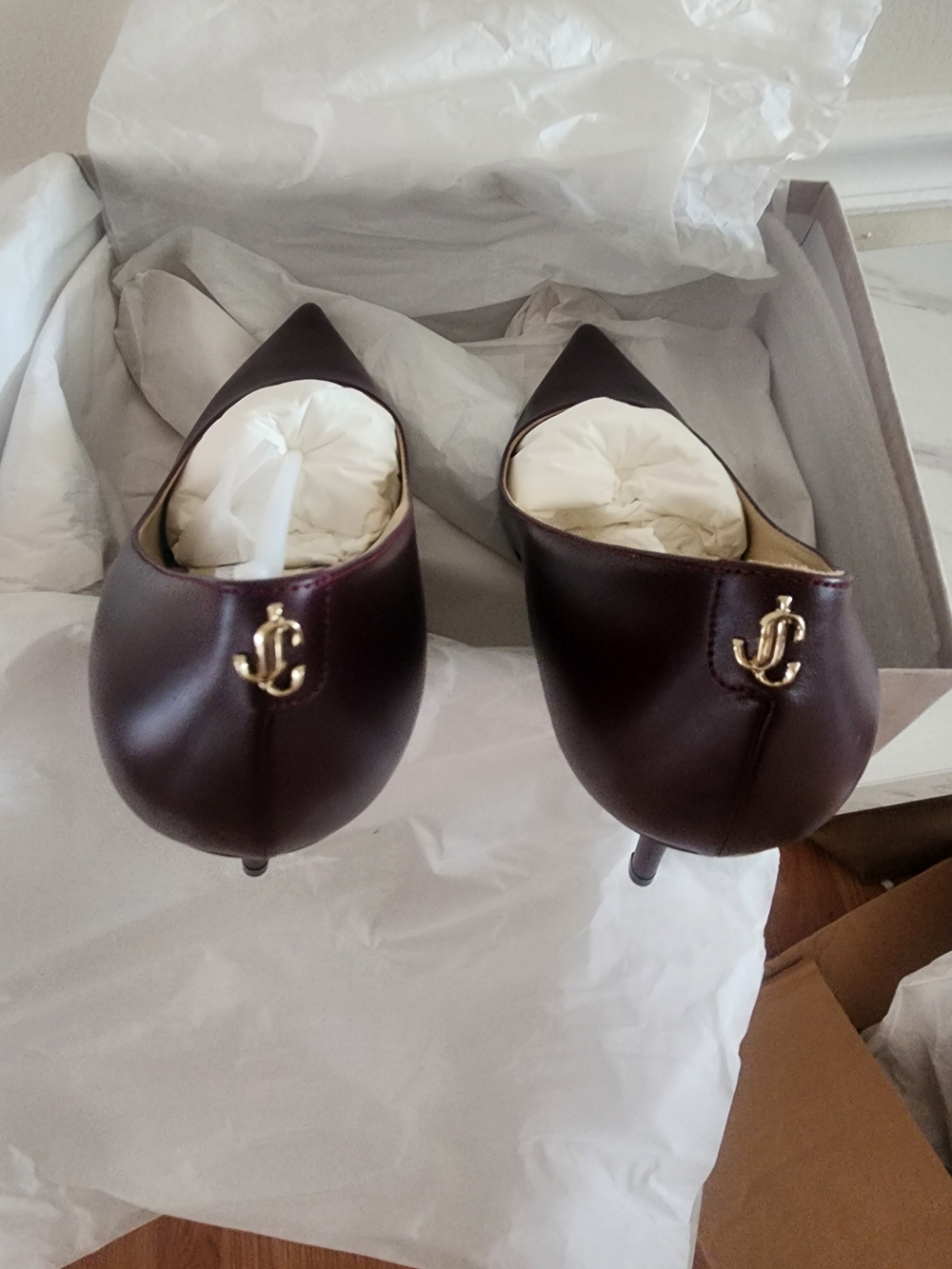 Jimmy Choo Pointed Toe Pumps in Burgundy with Gold Logo